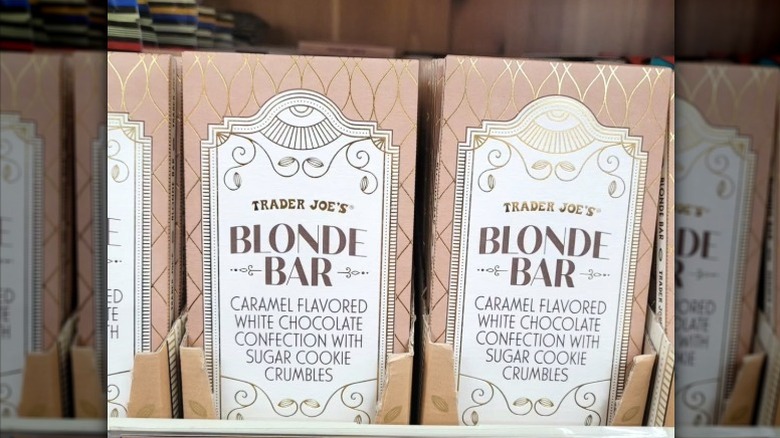 Bars of Trader Joe's Blonde Bars sitting on the store shelf.