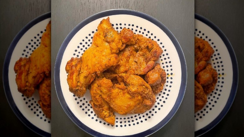 A plate of Trader Joe's Shawarma Chicken Thighs.