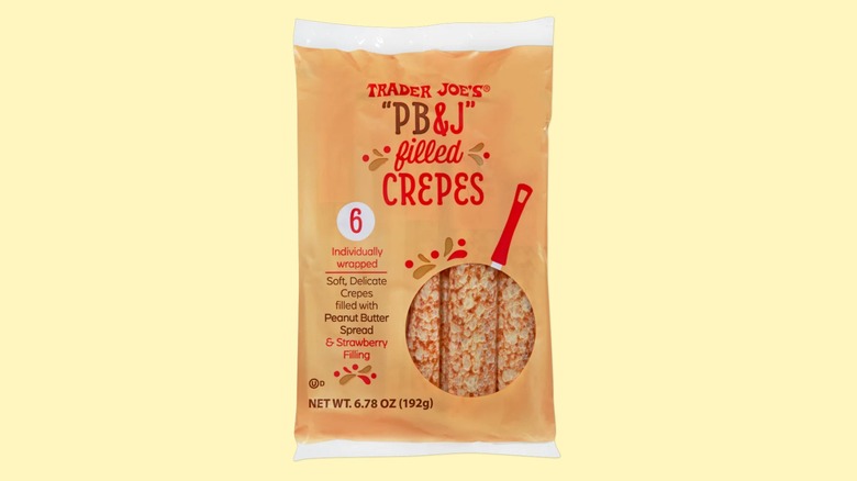 A bag of the Trader Joe's PB & J Filled Crepes on a yellow background.