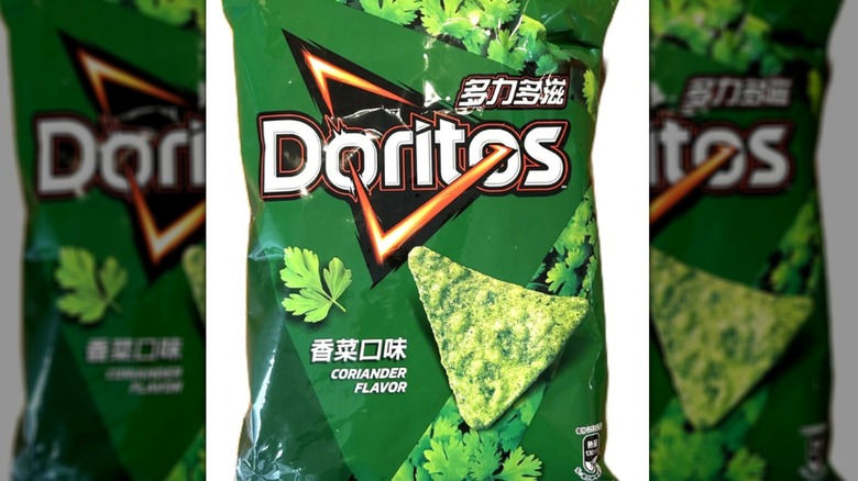 Coriander flavor Doritos packet on white background