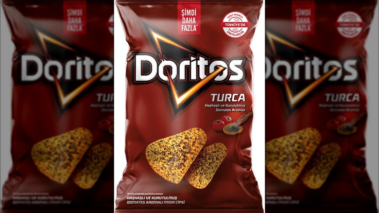 Tomato and poppy seed Doritos on a white background