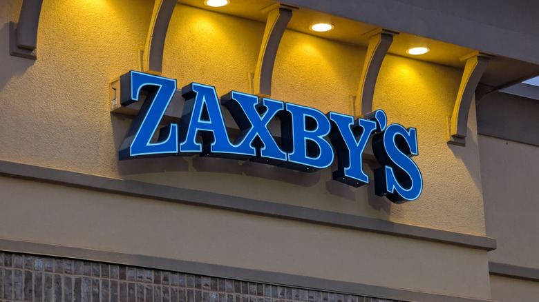 Blue Zaxby's sign with lights above