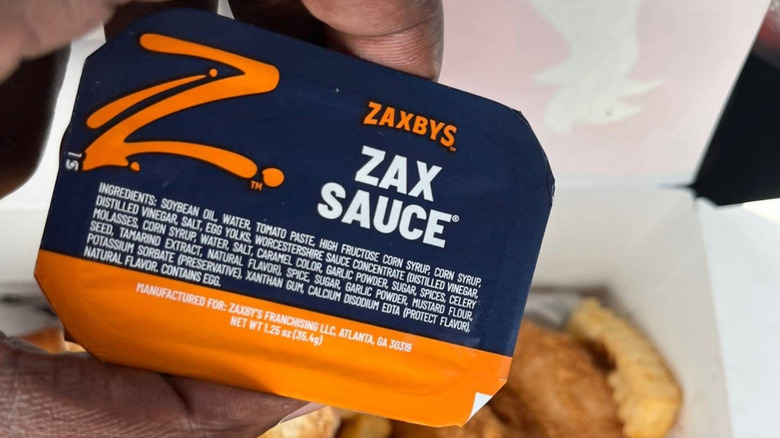 Zax Sauce with chicken tenders and fries in the background