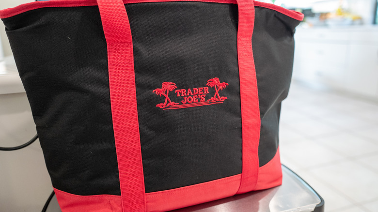 Close-up of embroidered logo on Trader Joe's bag