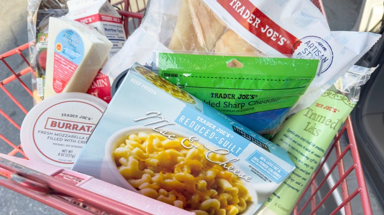 view of several Trader Joe's perishable food items in a shopping cart