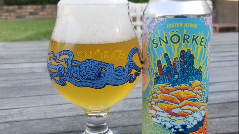 Cup and can of Jester King Snorkel beer
