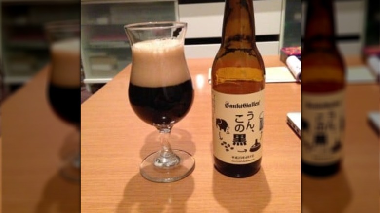 Bottle and filled glass of Sankt Gallen Un, Kono Kuro beer