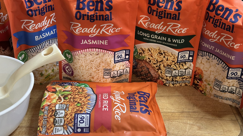 Ben's Original Ready Rice pouches standing up, one lying vertical