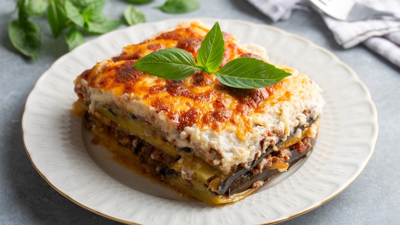 Traditional Greek potato and meat casserole with cheese, moussaka