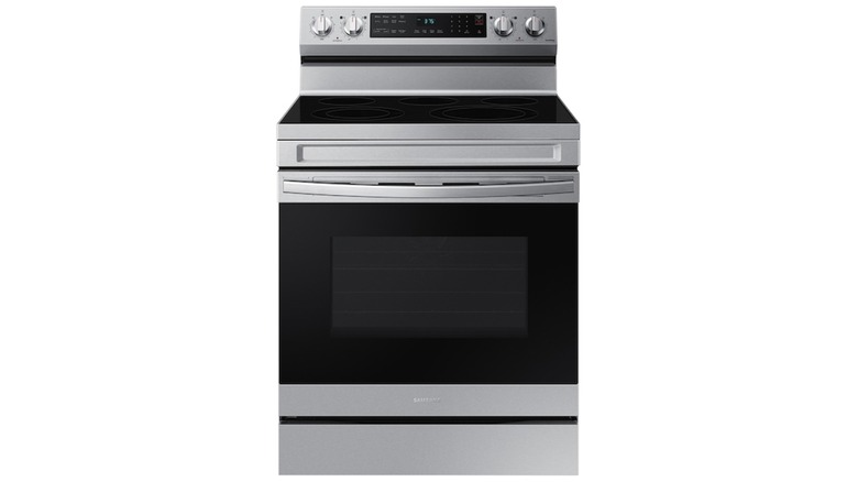 Samsung Smart Freestanding Electric Range by black cabinets