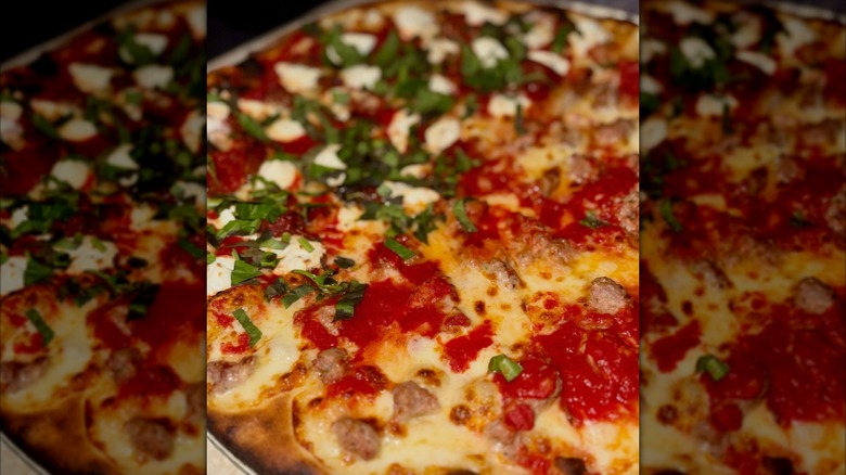 Close up of cheese, Pepperoni, Sausage pizza from John's of Bleecker Street