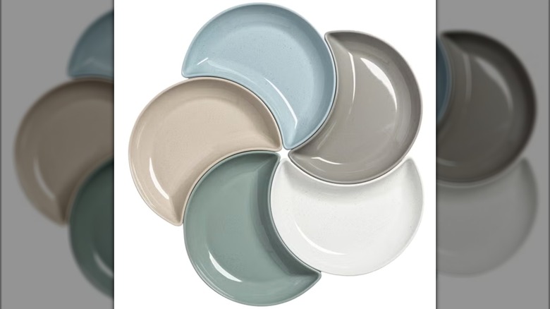 The over&back 5-piece Serve Set arranged in spiral design on white background