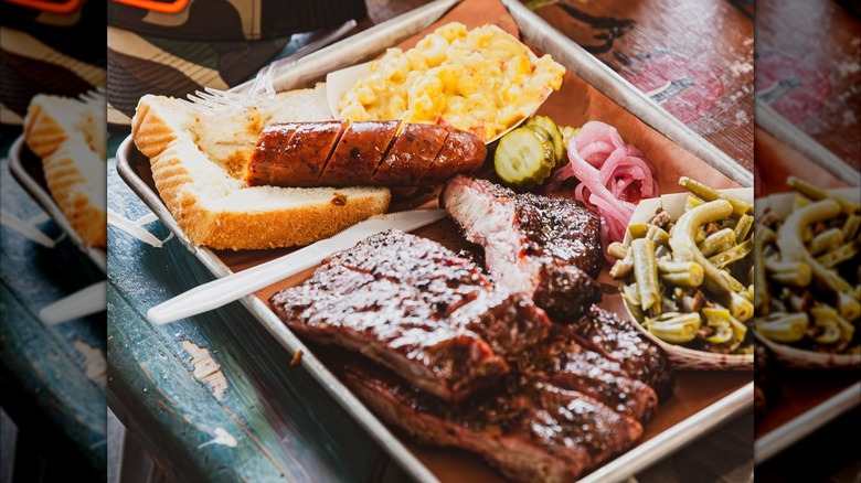 Barbecue tray from Shotgun Willie's restaurant with ribs, sausage, and mac and cheese