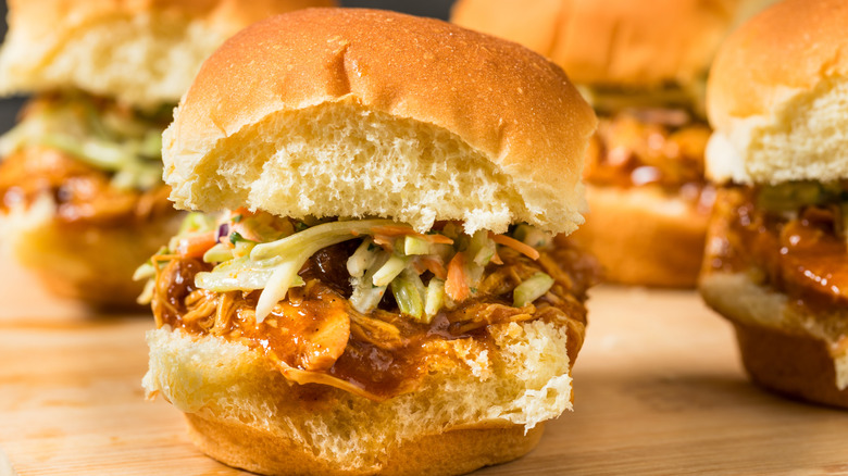 Shredded barbecue chicken sliders with coleslaw