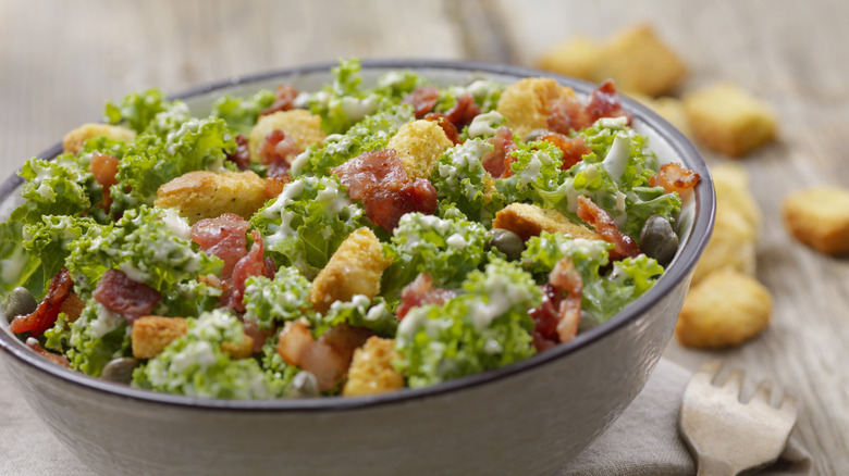Salad with bacon dressing
