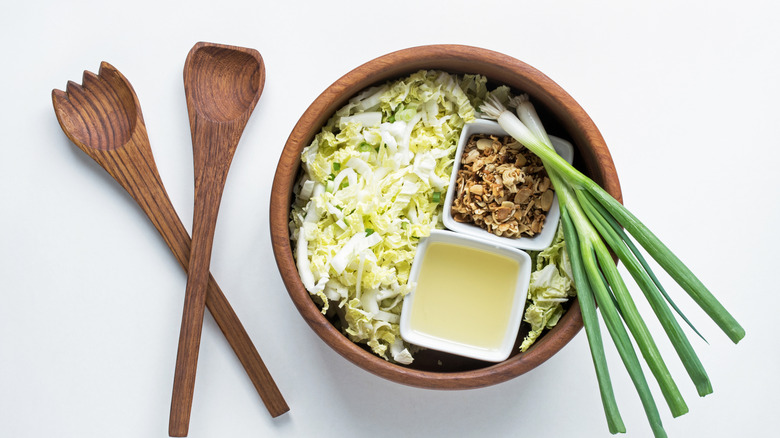 Asian cabbage salad in a wood bowl