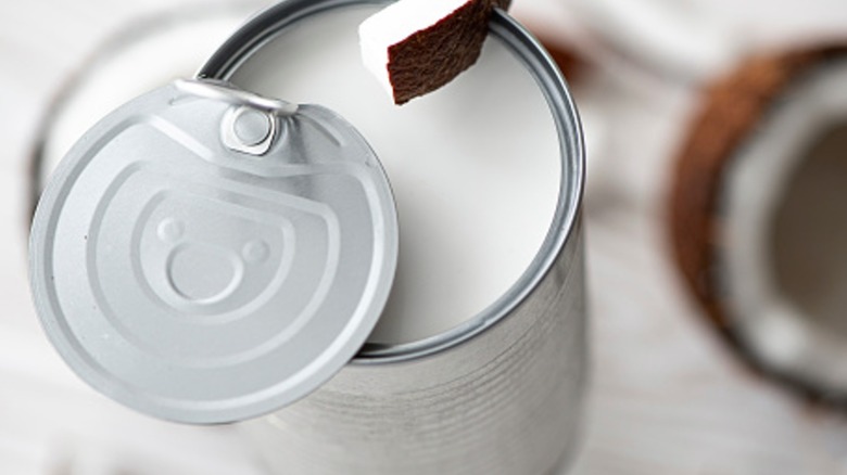 coconut milk in an open can with coconut