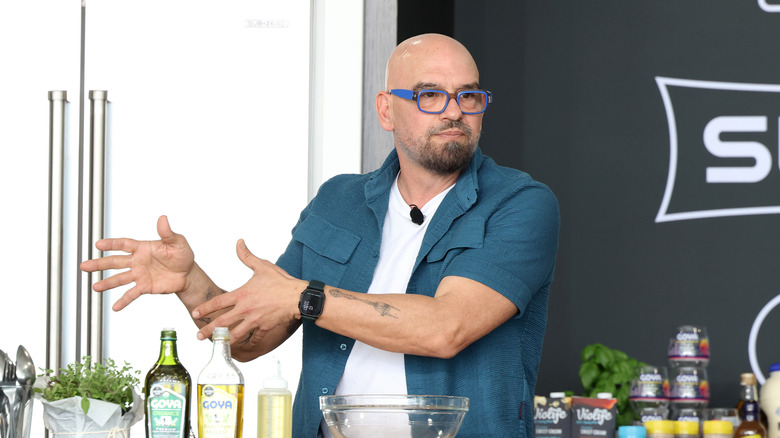 Michael Symon is seen during SOBEWFF 2025 at the Grand Tasting