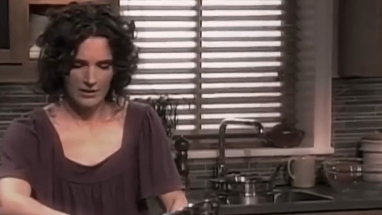 A screen shot of Amy Finley from the Food Network working in a studio kitchen