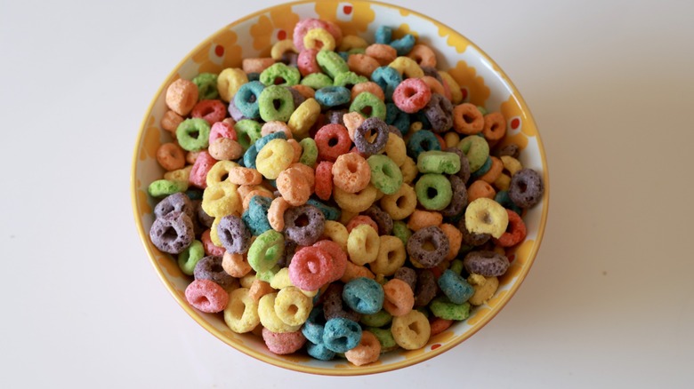 Close up macro image of some colorful Froot Loops Cereal in a bowl