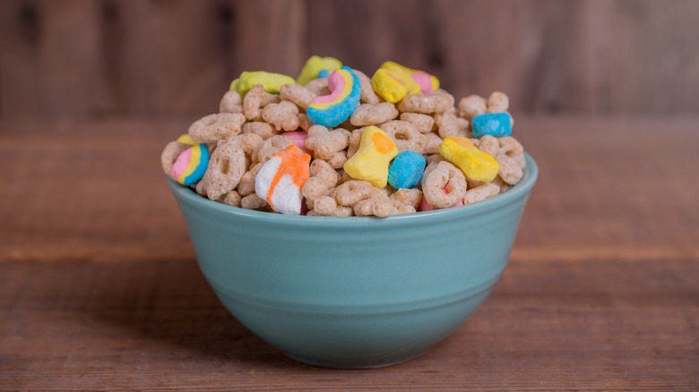Close-up of a bowl of Lucky Charms cereal with colorful marshmallows visible