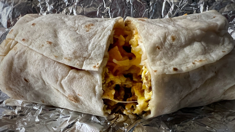 breakfast burrito on a foil wrapper