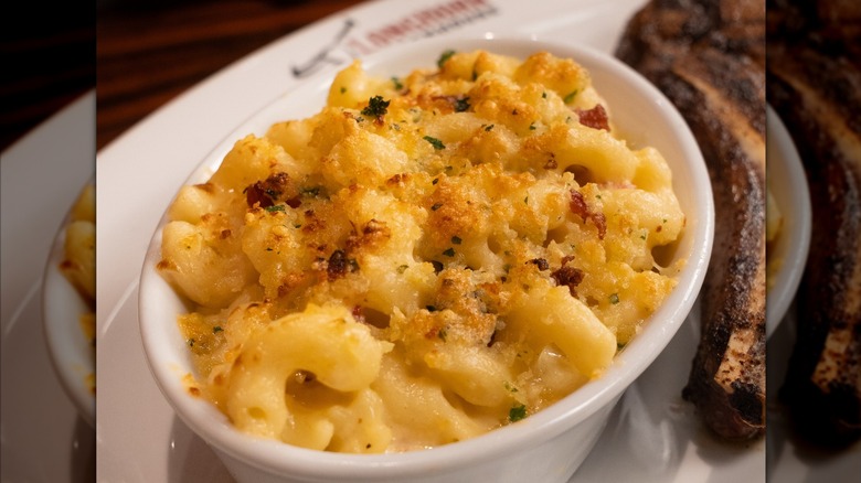 baked mac and cheese with parmesan and bread crumbs in bowl at LongHorn Steakhouse