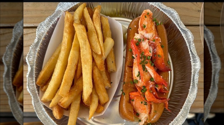 Lobster roll with side of French fries at Broad Street Oyster Company