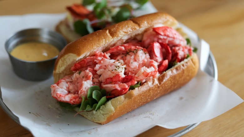 Lobster Roll: Chunks of fresh lobster mixed with mayonnaise and seasonings, served in a buttered, toasted bun