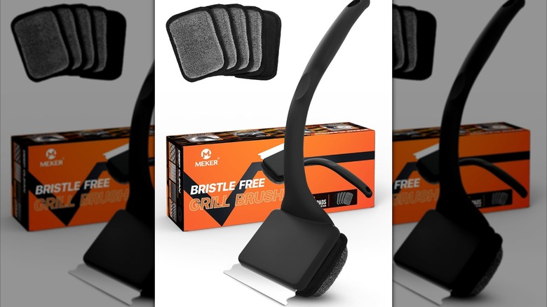 Meker bristle-free grill brush with replacement pads on white background