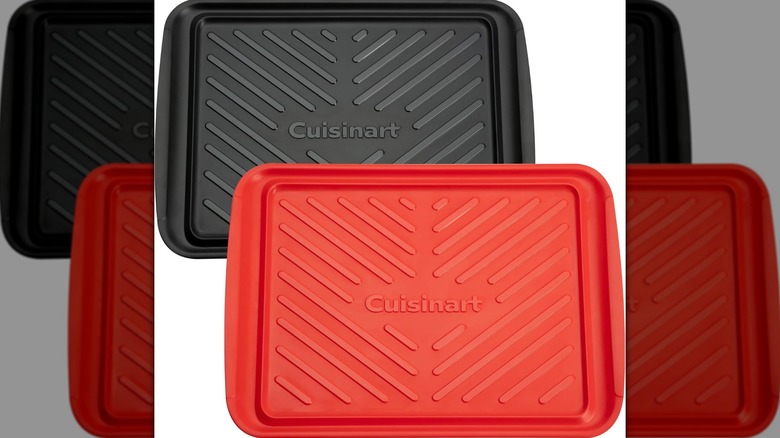Two red and black Cuisinart prep trays on white background