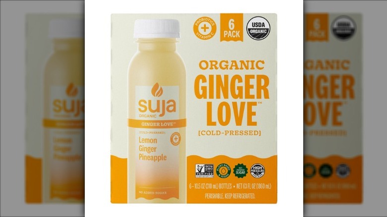A six-pack of Suja Organic Ginger Love cold-pressed juice blend bottles on a white background.