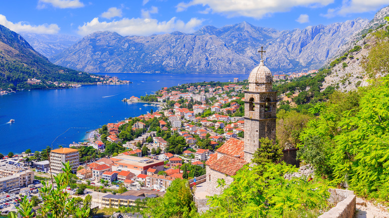 Mountains and historic town along water in Montenegro