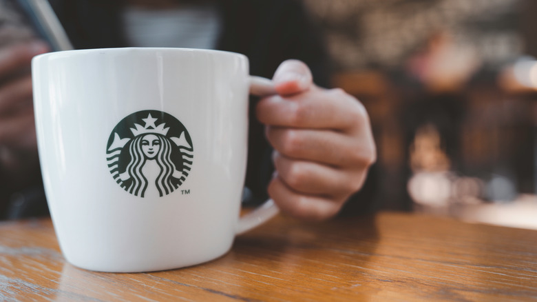 A Starbucks ceramic cup for hot drinks
