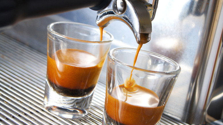 Two shots of espresso being brewed