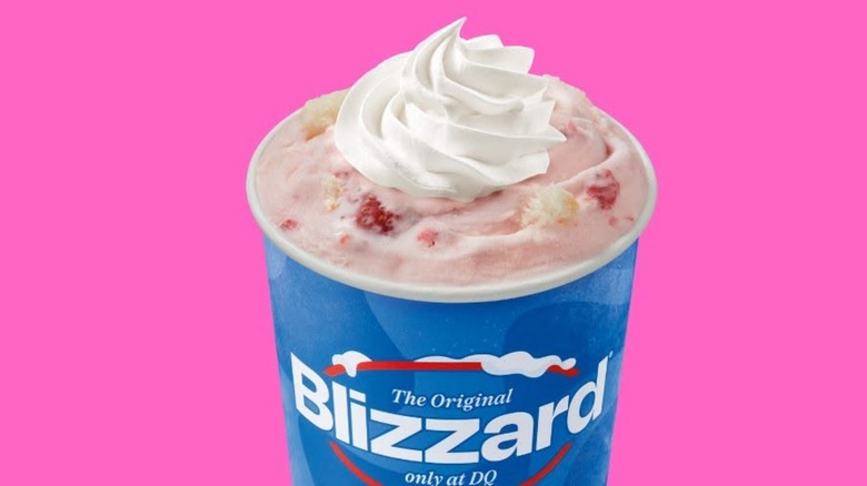 Strawberry Shortcake Blizzard from Dairy Queen with bright pink background