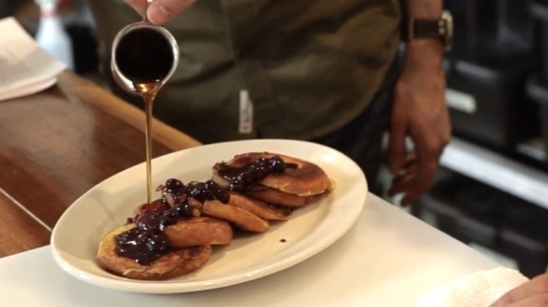 Donut French Toast on a white plate.