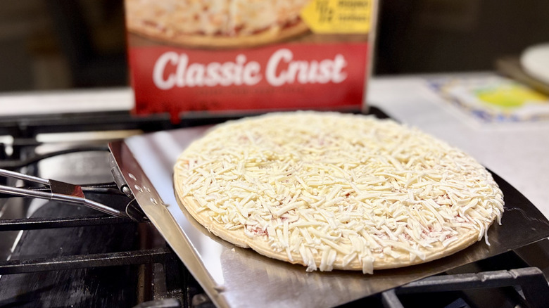 A box of DiGiorno classic crust cheese pizza ready to bake