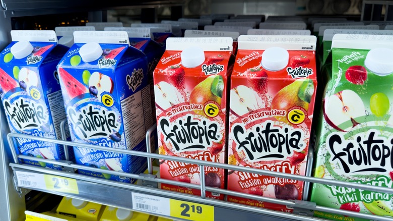 Fruitopia cartons on store shelf in many flavors