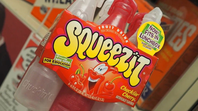 Six pack package of popular 90s plastic bottle cherry drinks called Squeezits