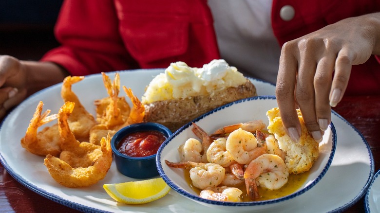 Red Lobster shrimp plate with baked potato and rangoons