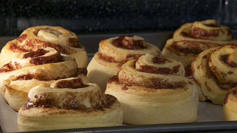 Cinnamon rolls baking in a convection oven