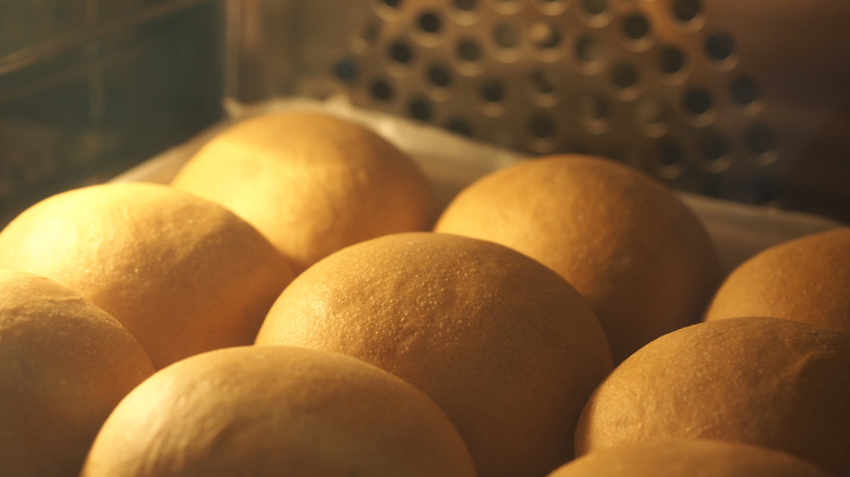 Bread rolls baking in a convection oven