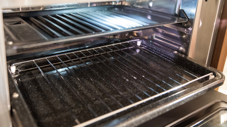Close-up of oven rack and tray in oven