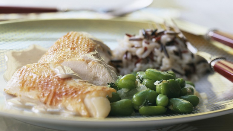 Poularde de Bresse in Sauternes sauce with broad beans and wild rice
