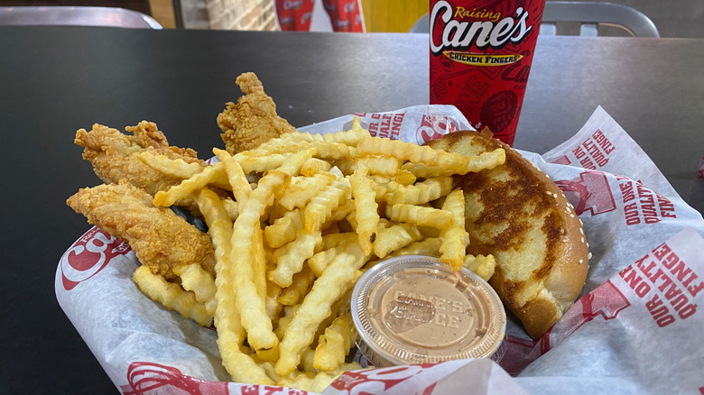 Raising Cane's combo with chicken, fries, bread, and sauce