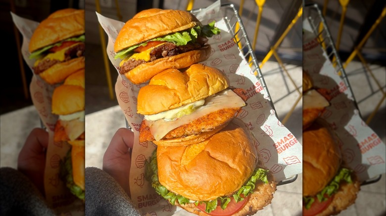 Three Smashburger sandwiches in tray