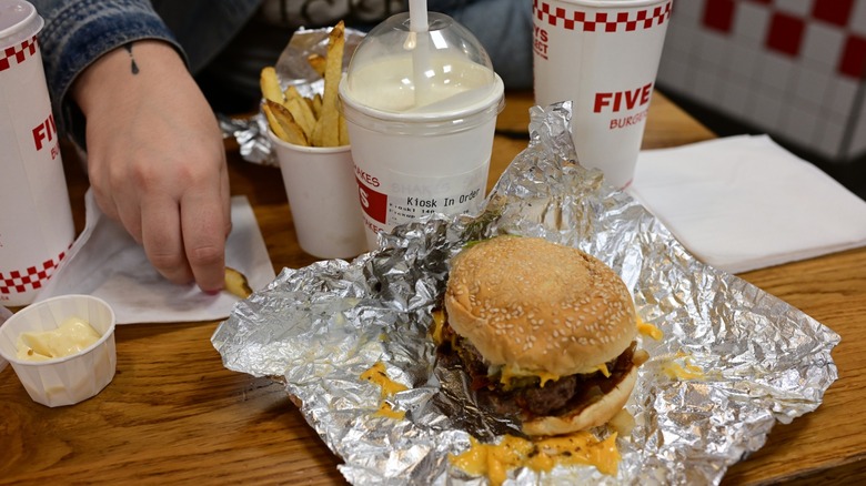 Hamburger Meal At A Five Guys Restaurant