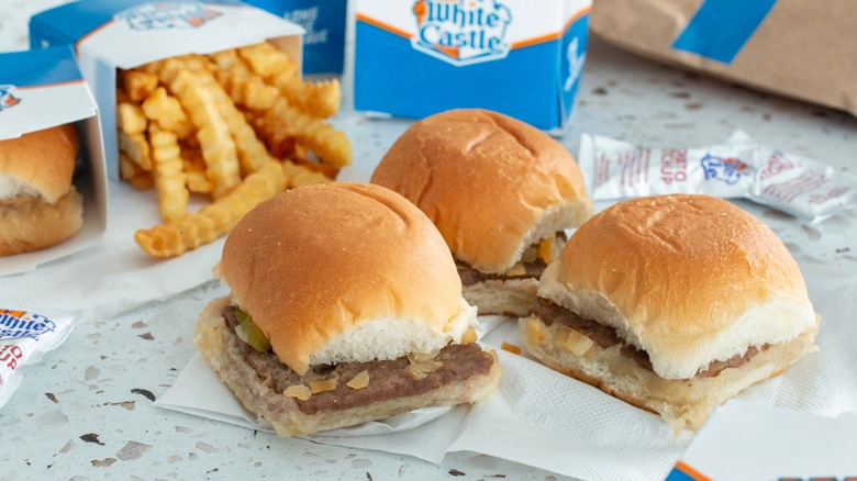 White Castle sliders and fries on a table.