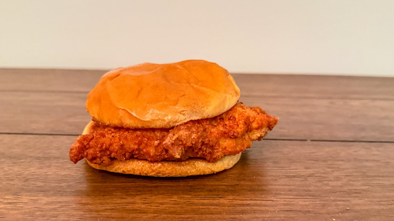 Chick-fil-A chicken sandwich on wooden table